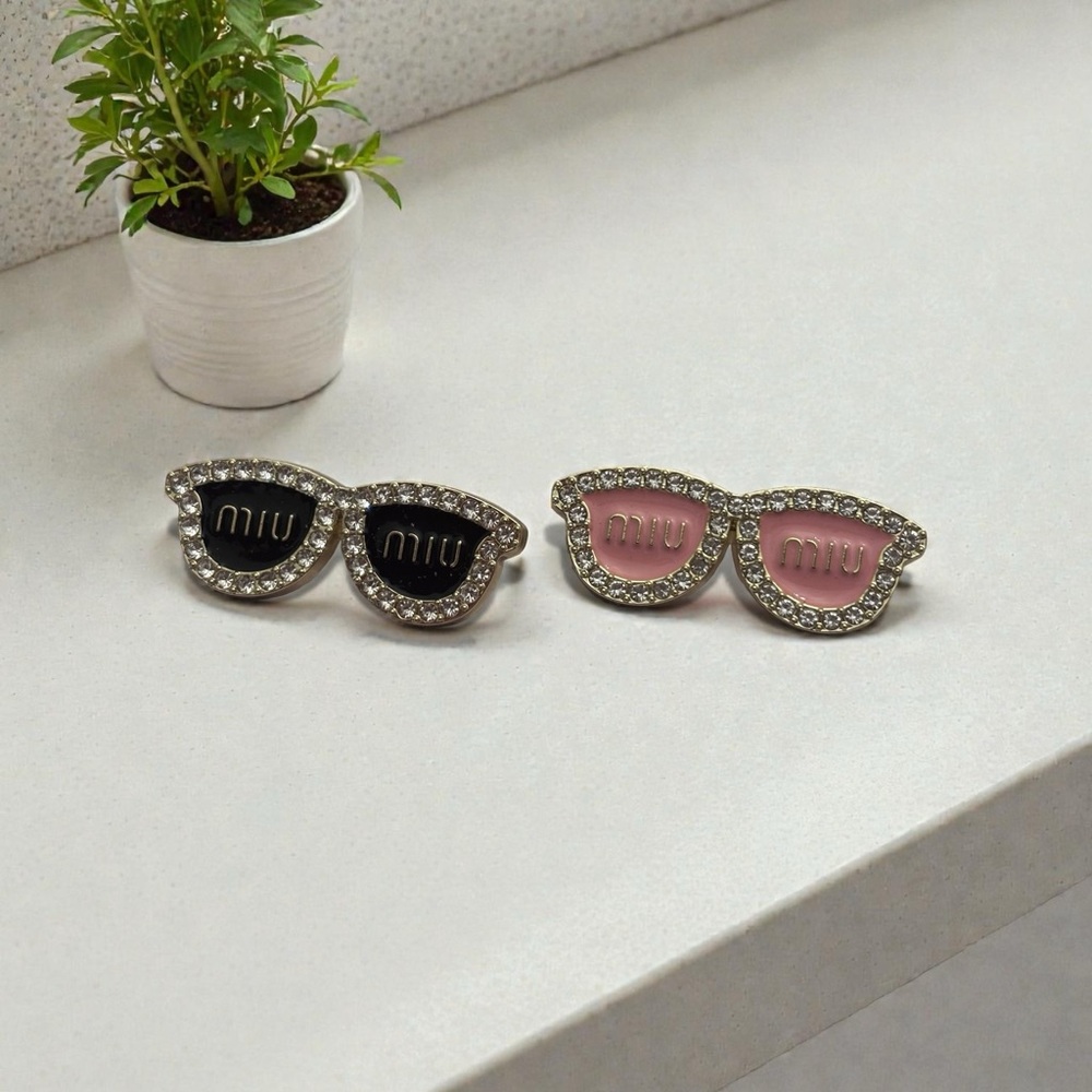 Miu Miu pink miu miu brooch made with zipper pulls